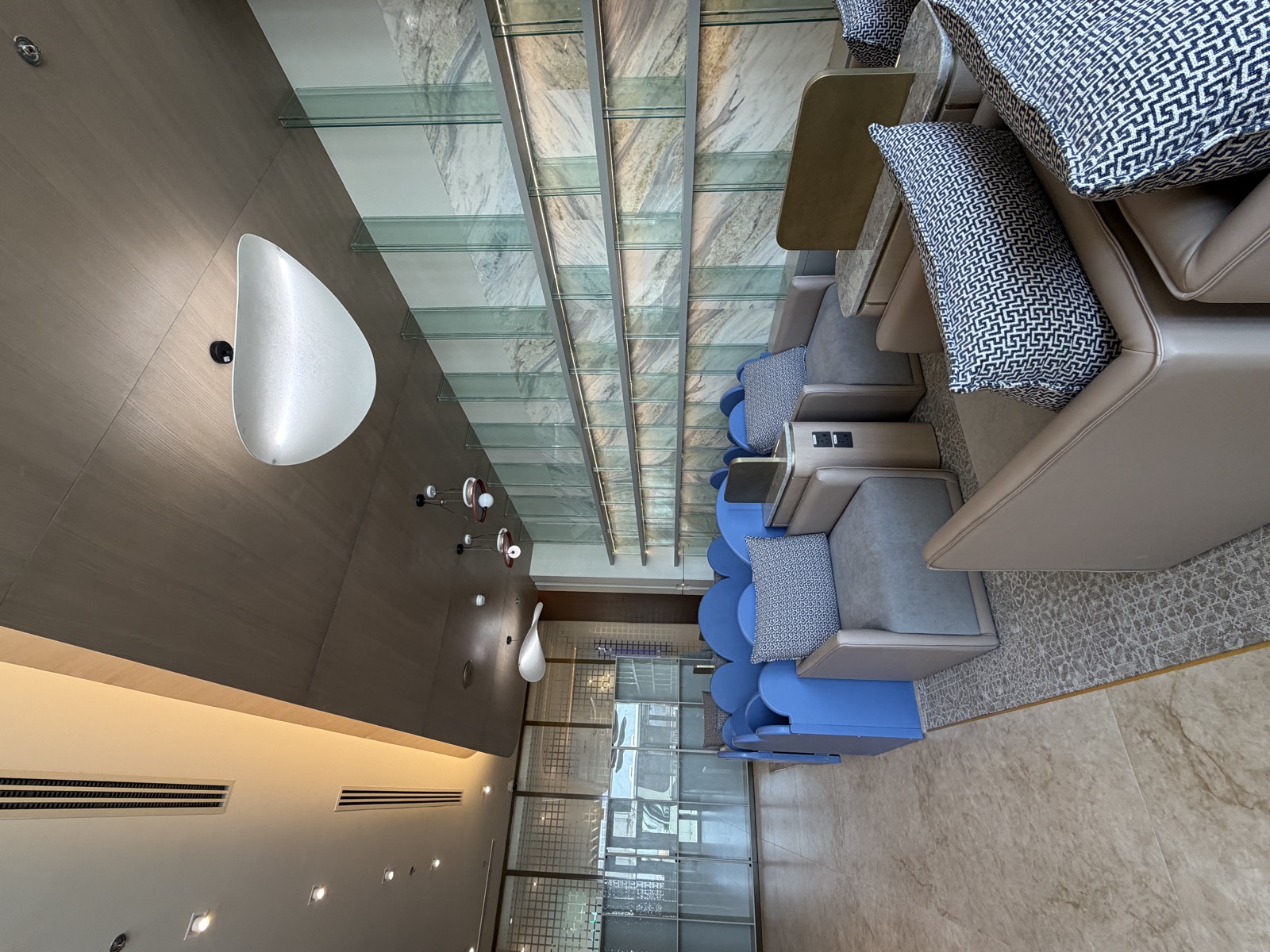 Lounge seating with marble feature wall